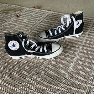 Black-and-white high top converse